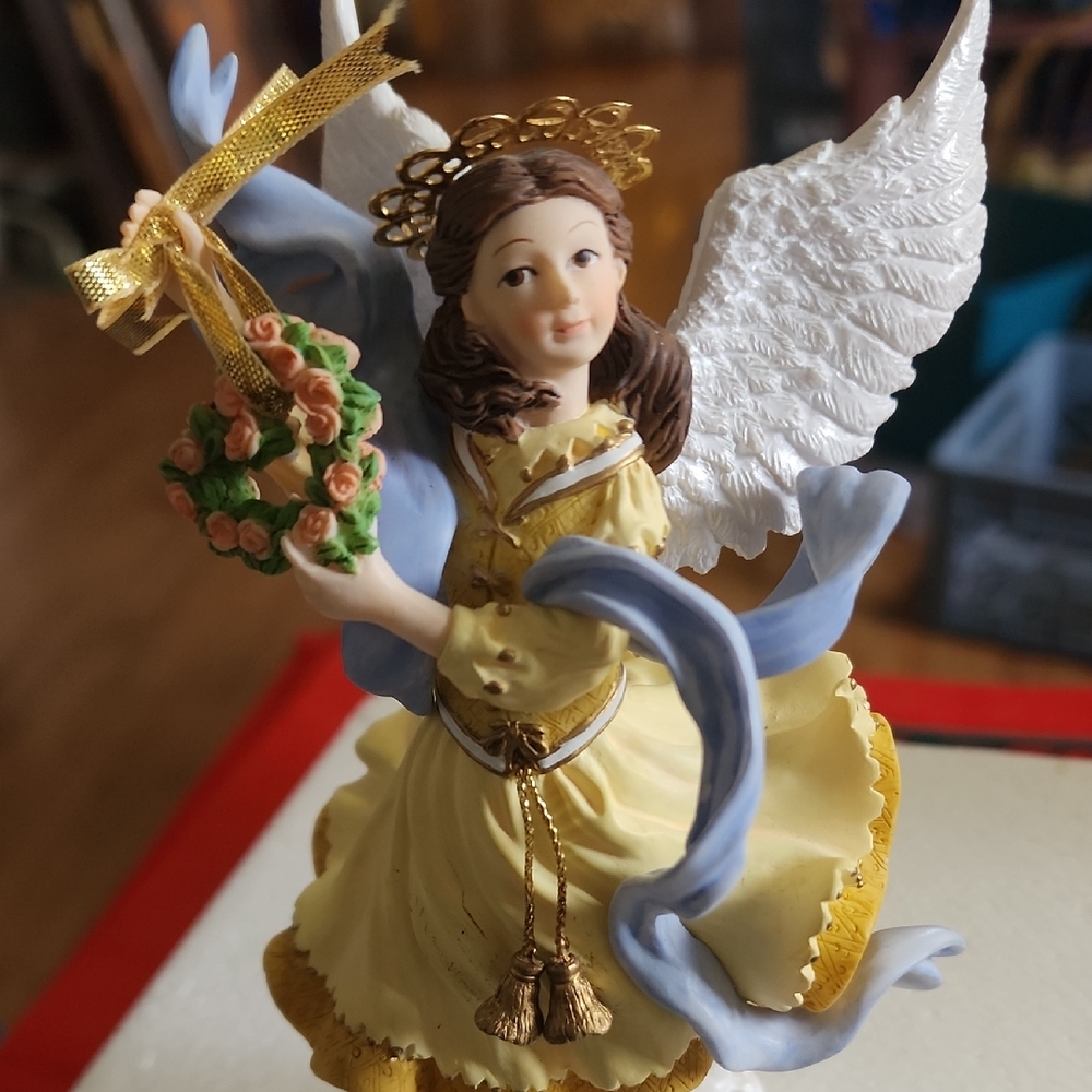 Angel Figurine with Flowers and Wings
